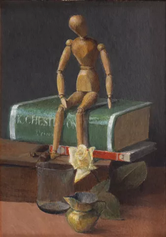 Manichino, libri, rosa gialla
